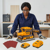 Professional carpenter preparing the Ingco finishing sander kit at a service bench