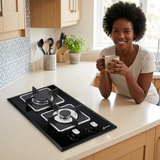 Relaxed tea-break lifestyle scene beside the Kaiser Grand Chef Domino black hob