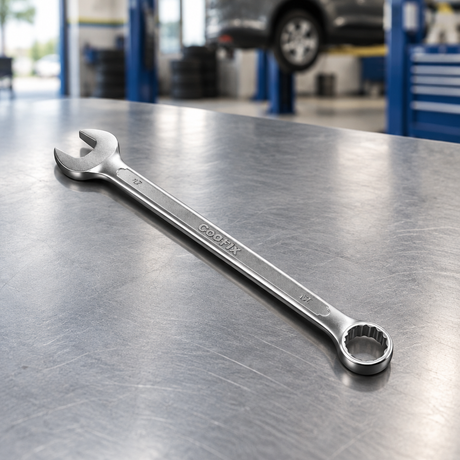 Single Coofix combination spanner on a workbench