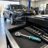 Serviced vehicle ready to leave a professional bay with the JcTop reversible ratchet returned to its tool drawer