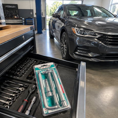 Ready vehicle in a clean workshop with the JcTop socket accessory set returned to an organised tool drawer