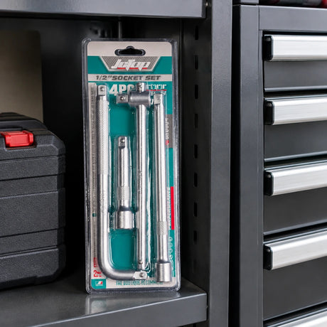 Packaged JcTop 1/2-inch socket accessory set stored in an organised professional automotive workshop cabinet