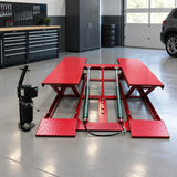 Mirage parallel-platform scissor vehicle lift parked in a clean automotive inspection bay