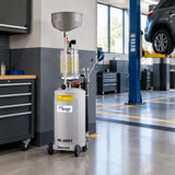 Mirage HC-2097 waste-oil extractor parked beside an organised fleet-maintenance service bay with hoses secured