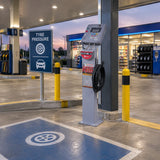 Mirage pedestal automatic tyre inflator parked at a dedicated passenger-car tyre-pressure station at a modern fuel station.