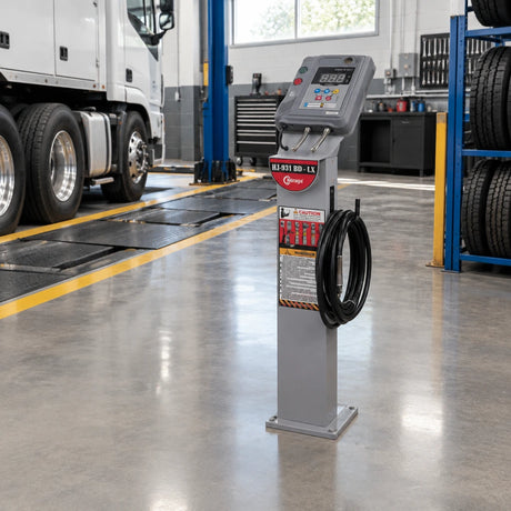 Mirage HJ-931BD-LX automatic tyre inflator parked in an organised heavy-duty vehicle tyre-service bay