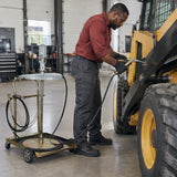 African American maintenance technician using the Mirage mobile grease pump trolley to lubricate a wheel loader joint