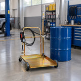 Mirage mobile oil pump trolley parked beside a bulk oil drum in a clean fleet workshop