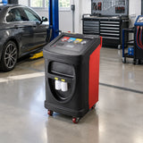 Mirage PL-AC300B refrigerant service machine parked in an organised automotive air-conditioning workshop