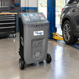 Mirage R134a A/C recovery and recharge machine parked in an organised automotive climate-service bay
