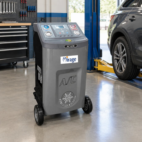 Mirage R134a A/C recovery and recharge machine parked in an organised automotive climate-service bay
