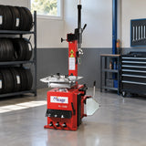 Mirage semi-automatic tyre changer parked at an organised professional tyre-service station before use.