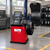 Mirage PL-1828 wheel balancer parked in an organised professional tyre-service workshop
