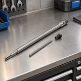 Mister SDS-Plus core drill extension adapter kit stored on an organised masonry-tool workshop bench.