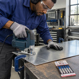 Technician guides a compatible jigsaw with an NRG T118A blade through clamped thin sheet metal