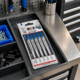 Packaged NRG T318A metal jigsaw blades resting in an organised metal-fabrication workshop consumables tray