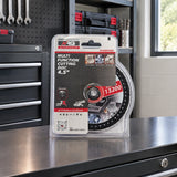 Packaged NRG diamond cutting disc resting on an organised metal-fabrication workshop tool cabinet.