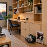 Finished plywood built-in office storage with an NRG wood saw blade package and compatible saw nearby