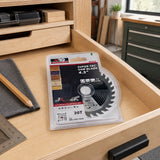 Packaged NRG Super-Tec 115 mm wood saw blade stored in an organised cabinetmaking workshop