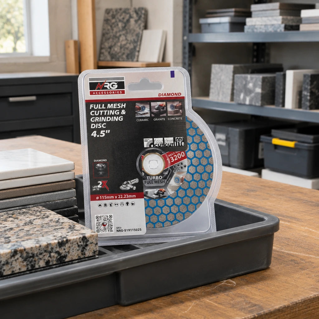 Packaged NRG 115mm diamond cutting and grinding disc stored in an organized stone-fabrication workshop beside tile and granite work materials.