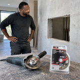 Finished reinforced-concrete service opening with a disconnected grinder and NRG diamond cutting disc package nearby