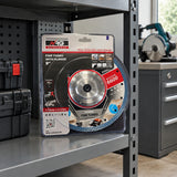 Packaged NRG Fine-Turbo diamond cutting disc stored on a clean shelf in a professional stone-fabrication workshop.