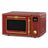 Kaiser Empire Bordeaux Red freestanding microwave oven with gold trim, black control panel and rotary knob on white background