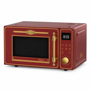 Kaiser Empire Bordeaux Red freestanding microwave oven with gold trim, black control panel and rotary knob on white background
