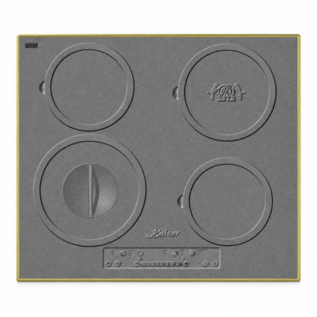 Kaiser KCT 6705 RI Herd grey four-zone induction hob with antique-gold frame and front touch controls on white background