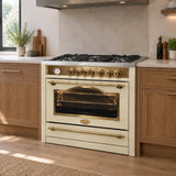 Ivory Kaiser Empire dual-fuel range cooker installed in a refined contemporary home kitchen with its five-burner hob and oven closed.