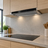 Kaiser EA 644 Eco built-in cooker hood installed beneath light-oak cabinets above a clean induction cooktop.