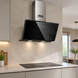 Kaiser Avantgarde Pro black-glass chimney hood installed above a hob in a contemporary apartment kitchen