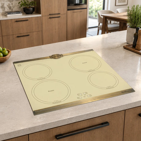 Ivory Kaiser Empire four-zone induction hob installed flush in a contemporary kitchen island.