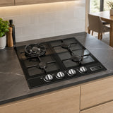 Kaiser black glass four-burner gas hob installed in a refined contemporary apartment kitchen.