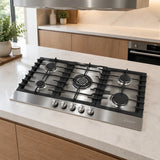 Kaiser stainless steel five-burner gas hob installed in a refined contemporary kitchen island