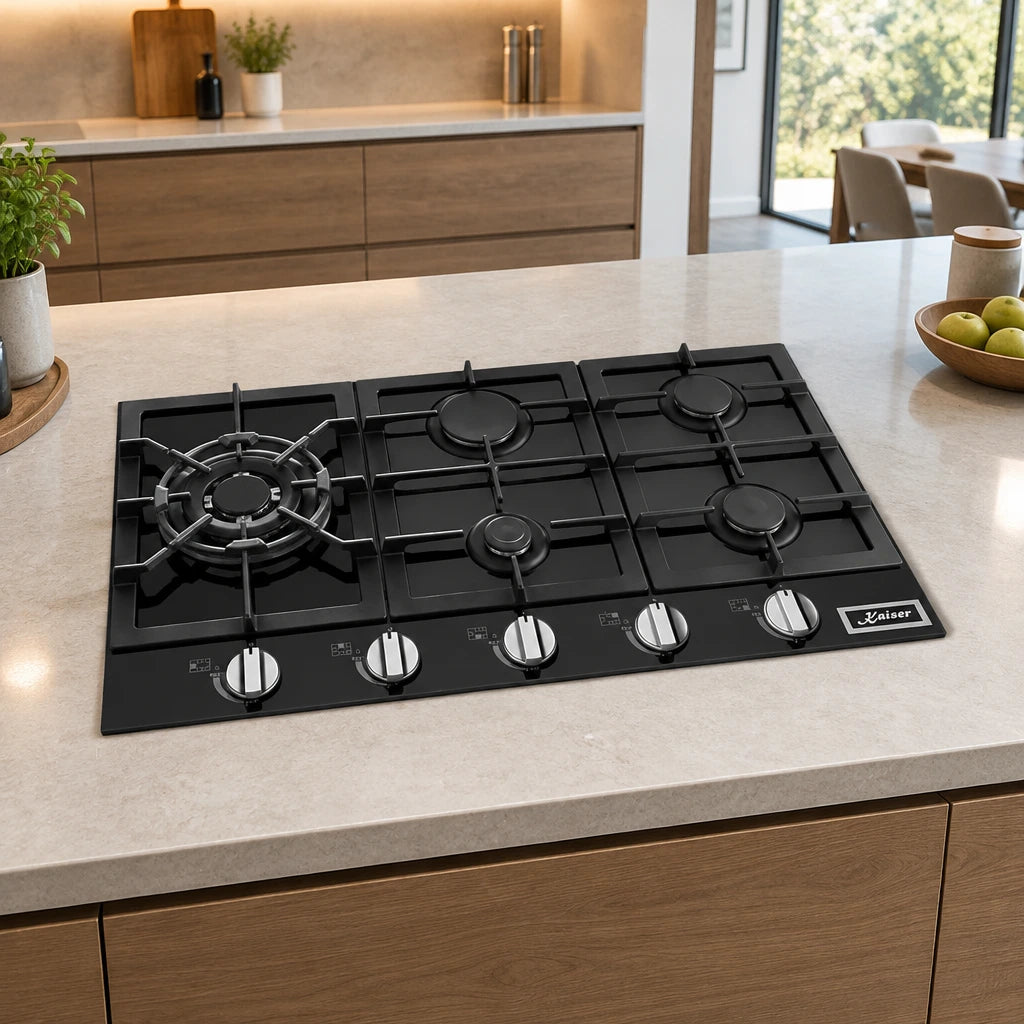 Kaiser five-burner black gas hob installed in a contemporary kitchen island before use