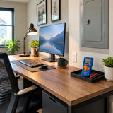 Organized home office with a Wadfow WDM2502 multimeter resting near a checked electrical access panel