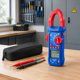 Wadfow WDM8802 clamp meter resting with its test probes in an organised electrical service workspace