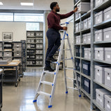 African American archive technician retrieving a box from high shelving with a Wadfow WLDF082 A-frame ladder