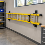 Closed Wadfow extension ladder stored horizontally in an organised commercial facilities storeroom