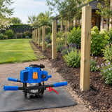Completed garden boundary posts with the inactive Wadfow earth auger power head resting nearby