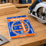Packaged Wadfow 185mm 40T wood saw blade resting at an organised carpentry workshop saw station.