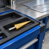 Wadfow WJD1403 step drill bit resting in an organised metal-fabrication tool cart