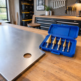 Finished panel with a clean enlarged opening beside the organised Wadfow WJD3405 step drill bit set