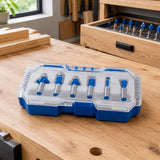 Closed Wadfow six-piece router bit set stored beside a clean woodworking bench in an organised joinery studio.