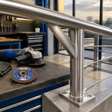 Finished steel handrail bracket with blended edges after Wadfow flap disc preparation in an organised fabrication workshop