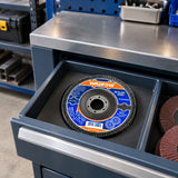 Unused Wadfow 115mm P40 flap disc stored in an organised metal fabrication workshop consumables area