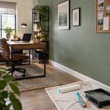 Freshly painted contemporary home office with the Total acrylic roller resting beside the finished wall