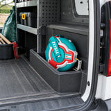 Total 20m steel measuring tape stored in an organised landscape contractor vehicle cargo compartment.