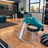 Total TSP631 face shield resting beside a prepared, organised maintenance workbench ready for use.